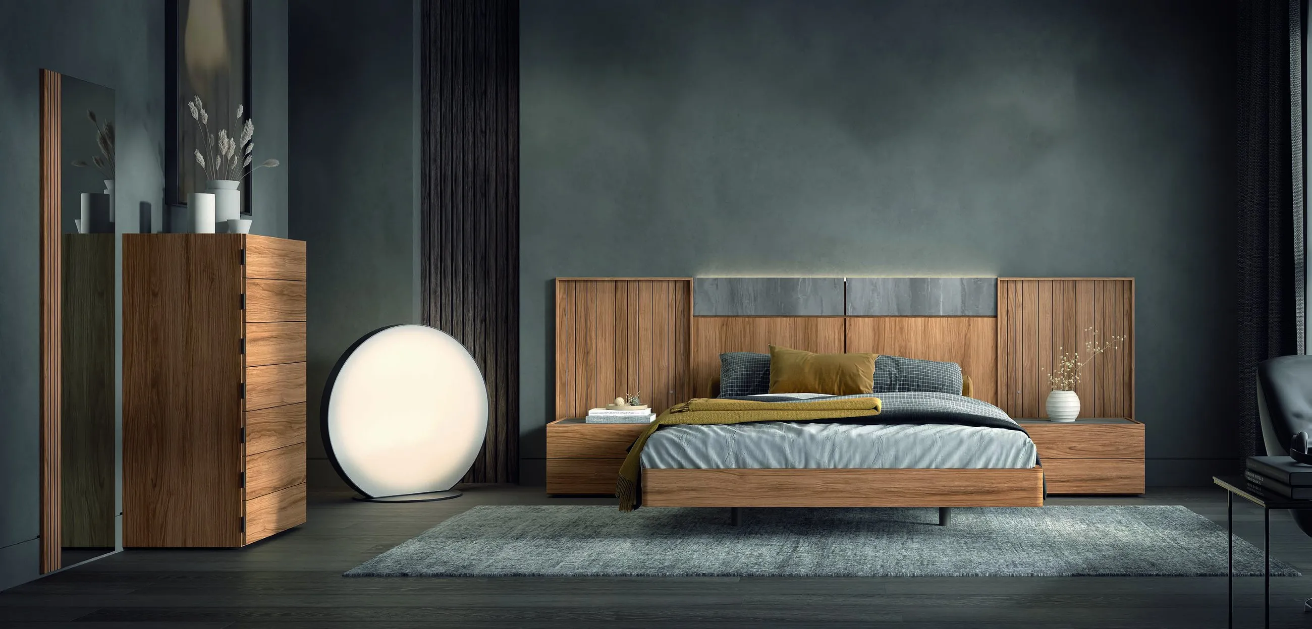 Dormitorio de matrimonio con cabecero de madera, mesitas a juego y cómoda
